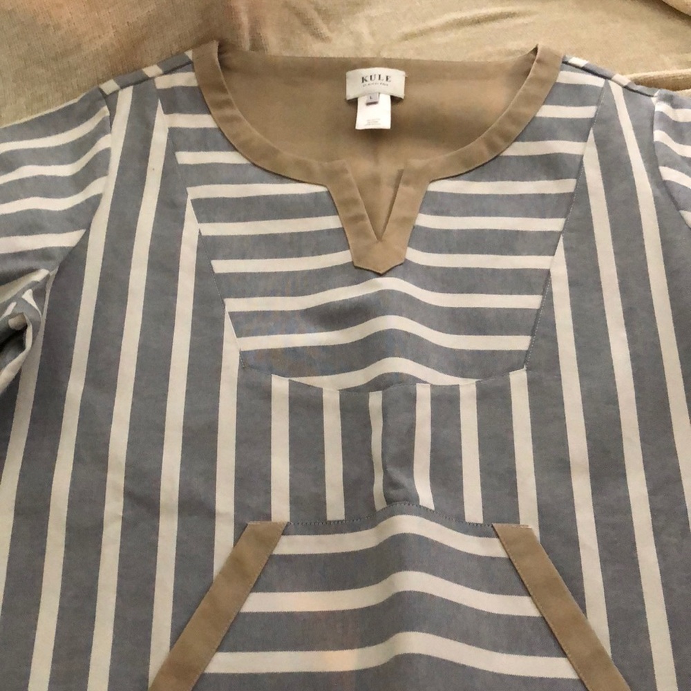 Cotton pull over.  Navy white and tan